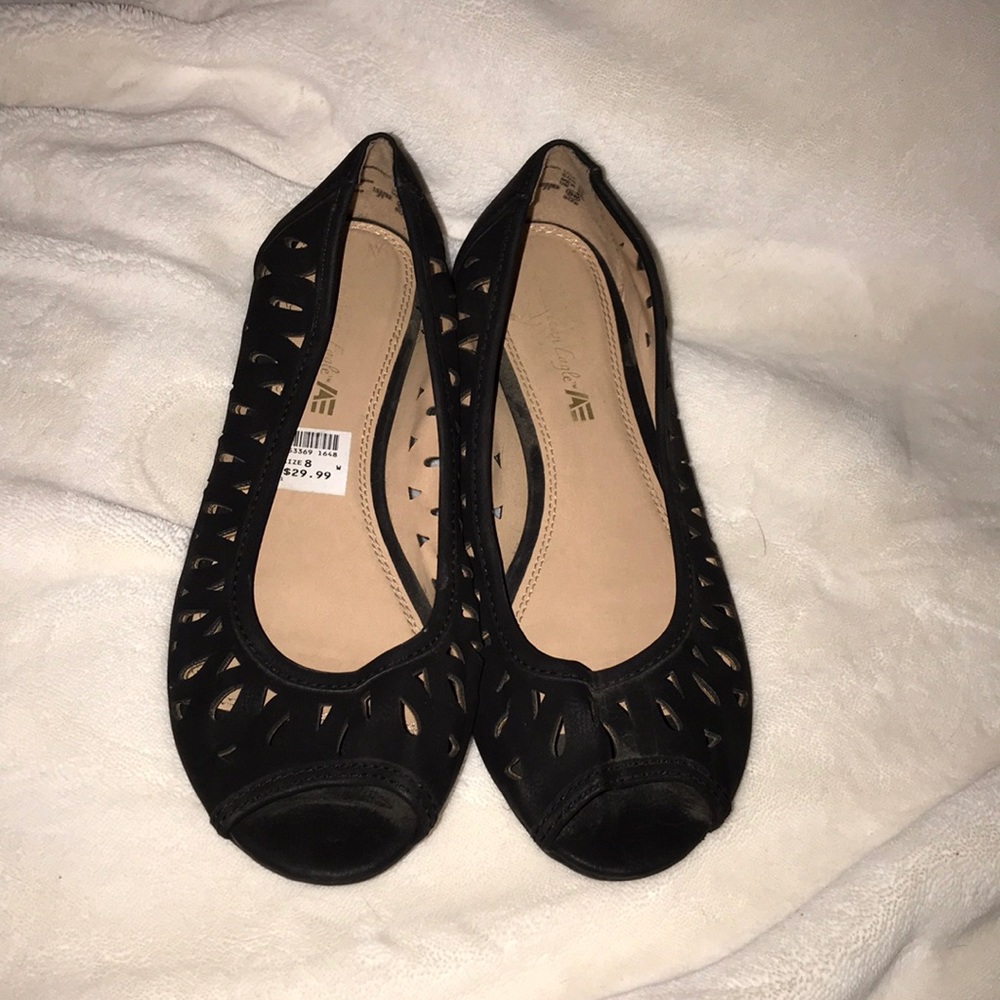 Gently used black flats